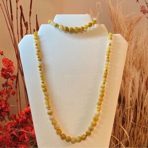 Genuine Topaz necklace 20” and bracelet 8 1/2 with gold findings.